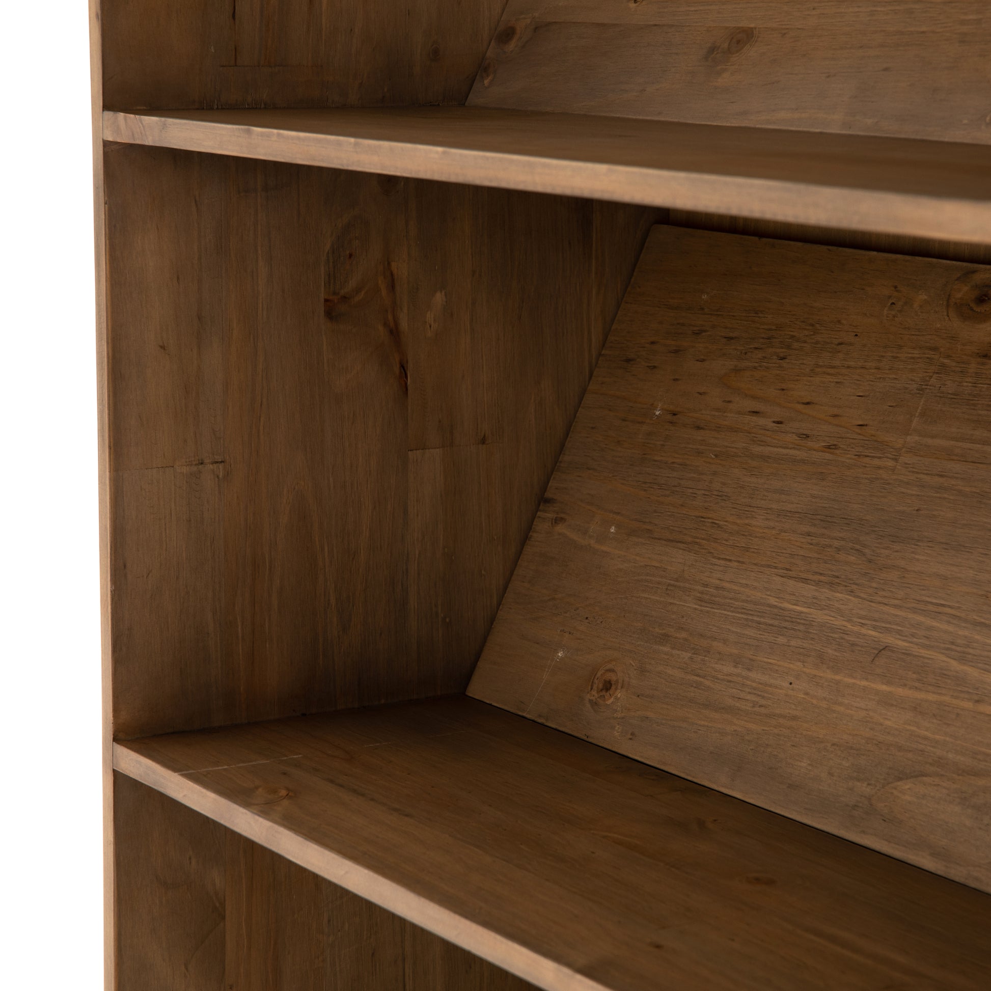 Five roomy shelves are ready to store favorite books and treasures, with smoked solid pine suited for any space. Removable ledges slant at an angle on each shelf, for even-better display of art and coffee table-size books, plus an optional slide ladder (for decorative use only) to complete the look.  Overall Dimensions: 35.50"w x 17.50"d x 98"h Colors: Smoked Pine, Black Iron Materials: Solid Pine, Iron