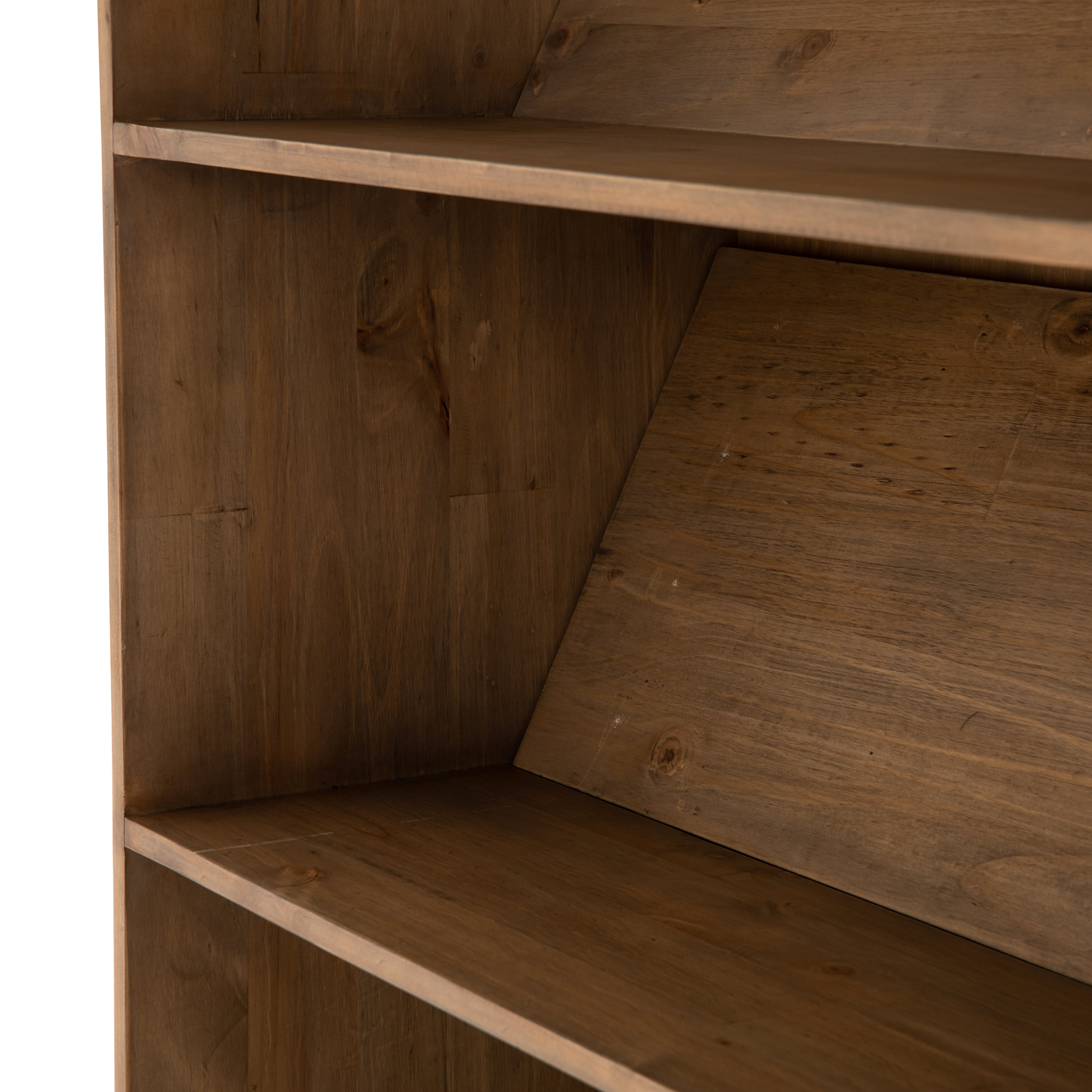 Five roomy shelves are ready to store favorite books and treasures, with smoked solid pine suited for any space. Removable ledges slant at an angle on each shelf, for even-better display of art and coffee table-size books, plus an optional slide ladder (for decorative use only) to complete the look.  Overall Dimensions: 35.50"w x 17.50"d x 98"h Colors: Smoked Pine, Black Iron Materials: Solid Pine, Iron