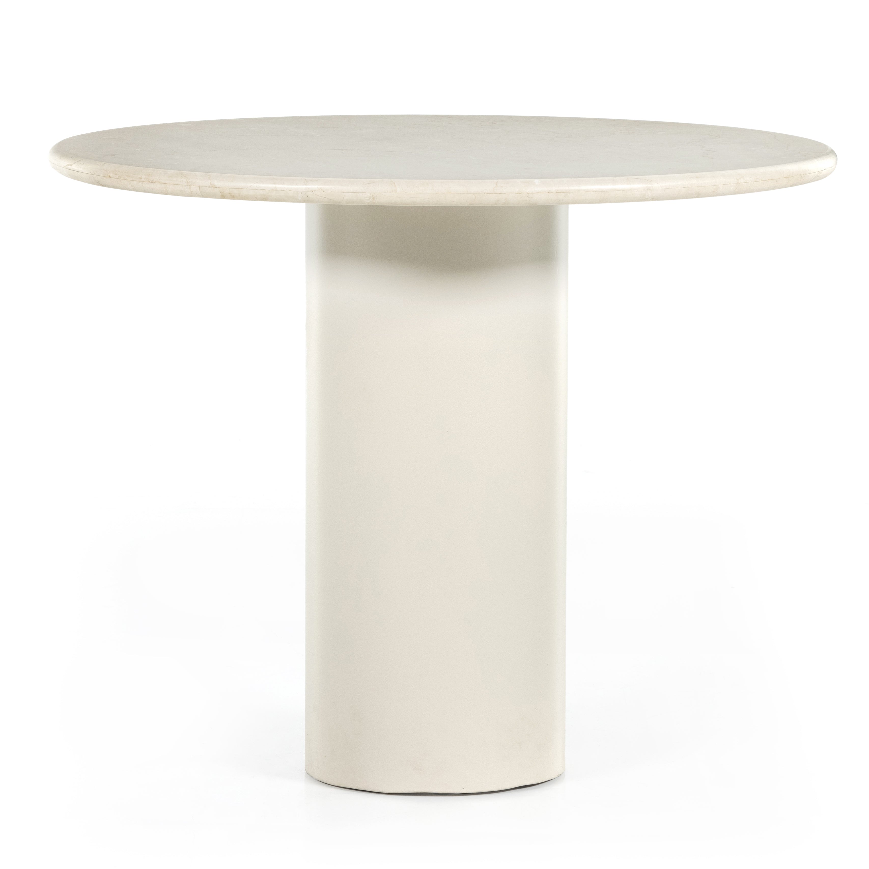 Simply sophisticated with this Belle Round Dining Table - Cream Marble. This bistro-style table inspired by 1970s Italian design features an ivory-finished iron base and supports a rounded tabletop of cream-colored solid marble for a fresh, monochromatic look that pairs with just about anything.  Overall Dimensions: 38.00"w x 38.00"d x 30.00"h