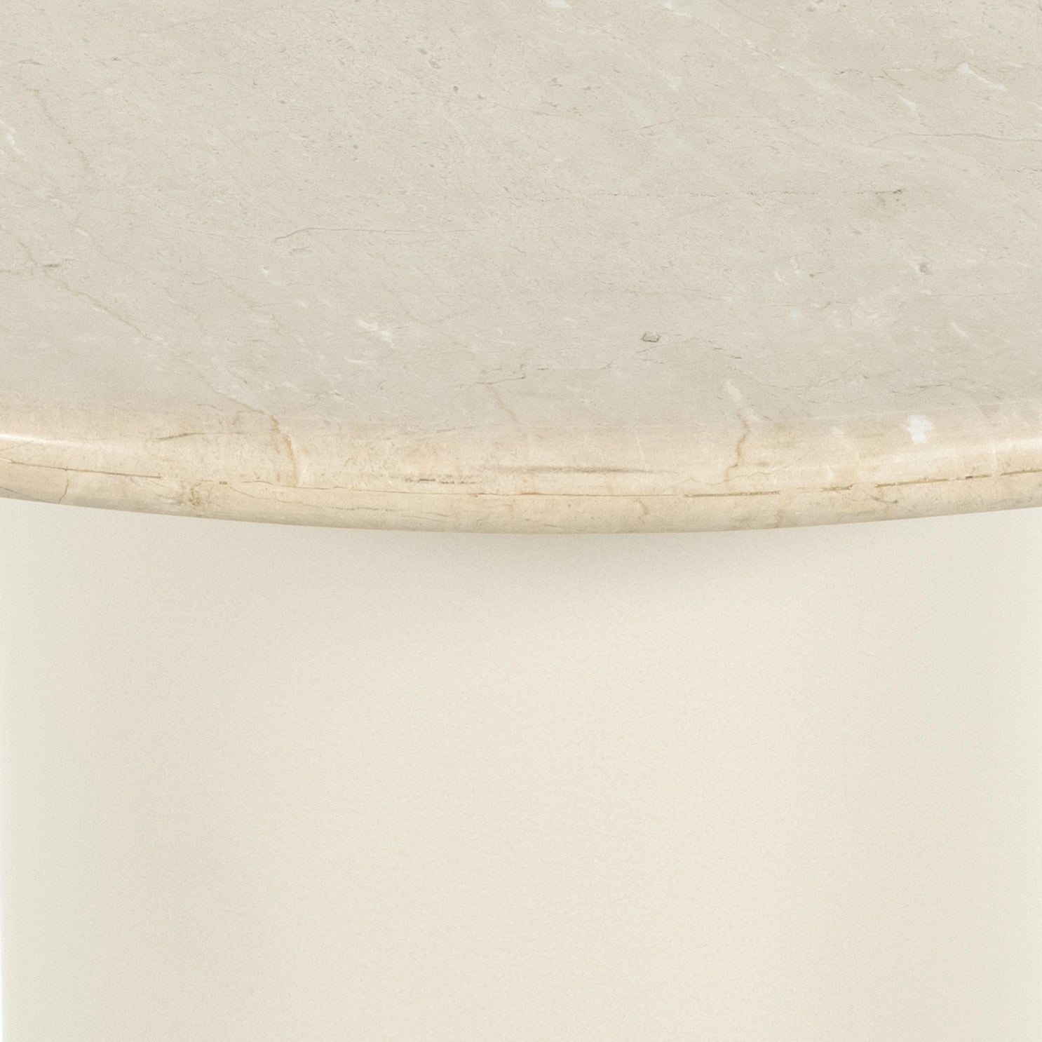 Simply sophisticated with this Belle Round Dining Table - Cream Marble. This bistro-style table inspired by 1970s Italian design features an ivory-finished iron base and supports a rounded tabletop of cream-colored solid marble for a fresh, monochromatic look that pairs with just about anything.  Overall Dimensions: 38.00"w x 38.00"d x 30.00"h