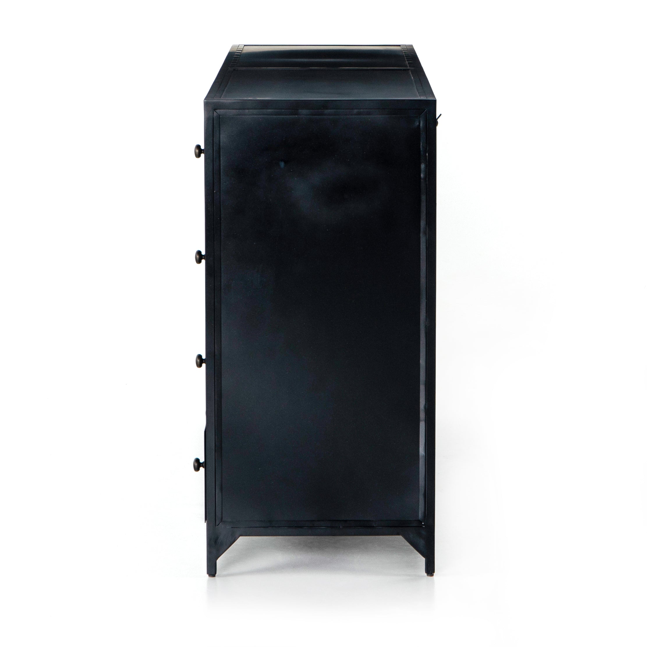 Featuring Belmont Black 8 Drawer Metal Dresser by Four Hands at Amethyst Home. The brass knobs on this Belmont Black 8 Drawer Metal Dress give it a classy, antique look while also being the perfect vessel to store your clothes
Overall Dimensions: 70"W x 18.50"L x 38.50"HColors: BlackMaterials: IronWeight: 321.87 lbVolume: 43.3 cu ft.  Amethyst Home provides interior design, new home construction design consulting, vintage area rugs, and lighting in the Calabasas metro area.