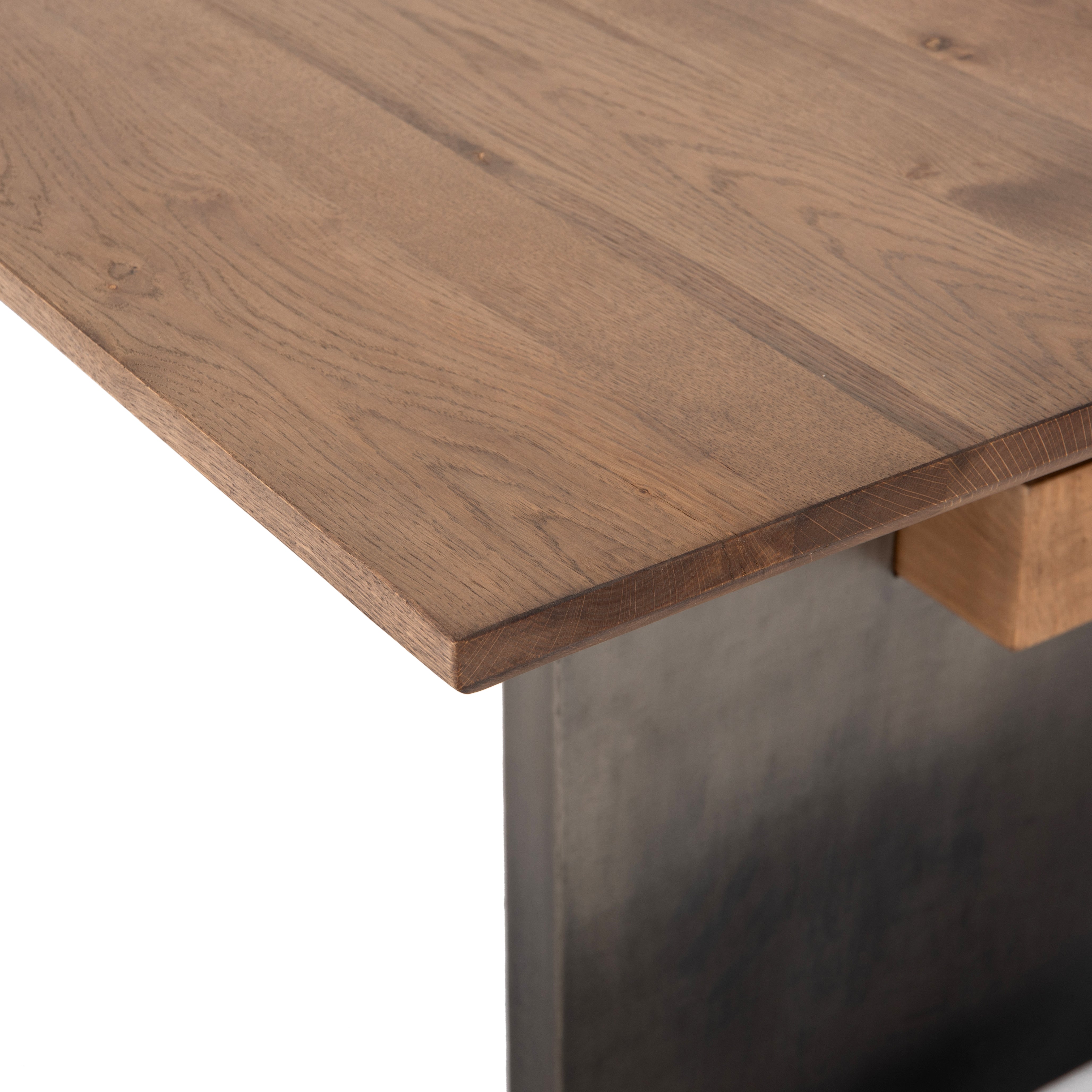 This Brennan Dining Table - Dove Oak has a rectangular soft-grey oak tabletop and flaunts its materials' natural graining, for a richly organic takeaway. Wide, plank-style legs of pewter-finished steel features an ombre pattern -- a statement piece for any dining room or kitchen area.   Overall Dimensions: 94.00"w x 42.00"d x 30.00"h