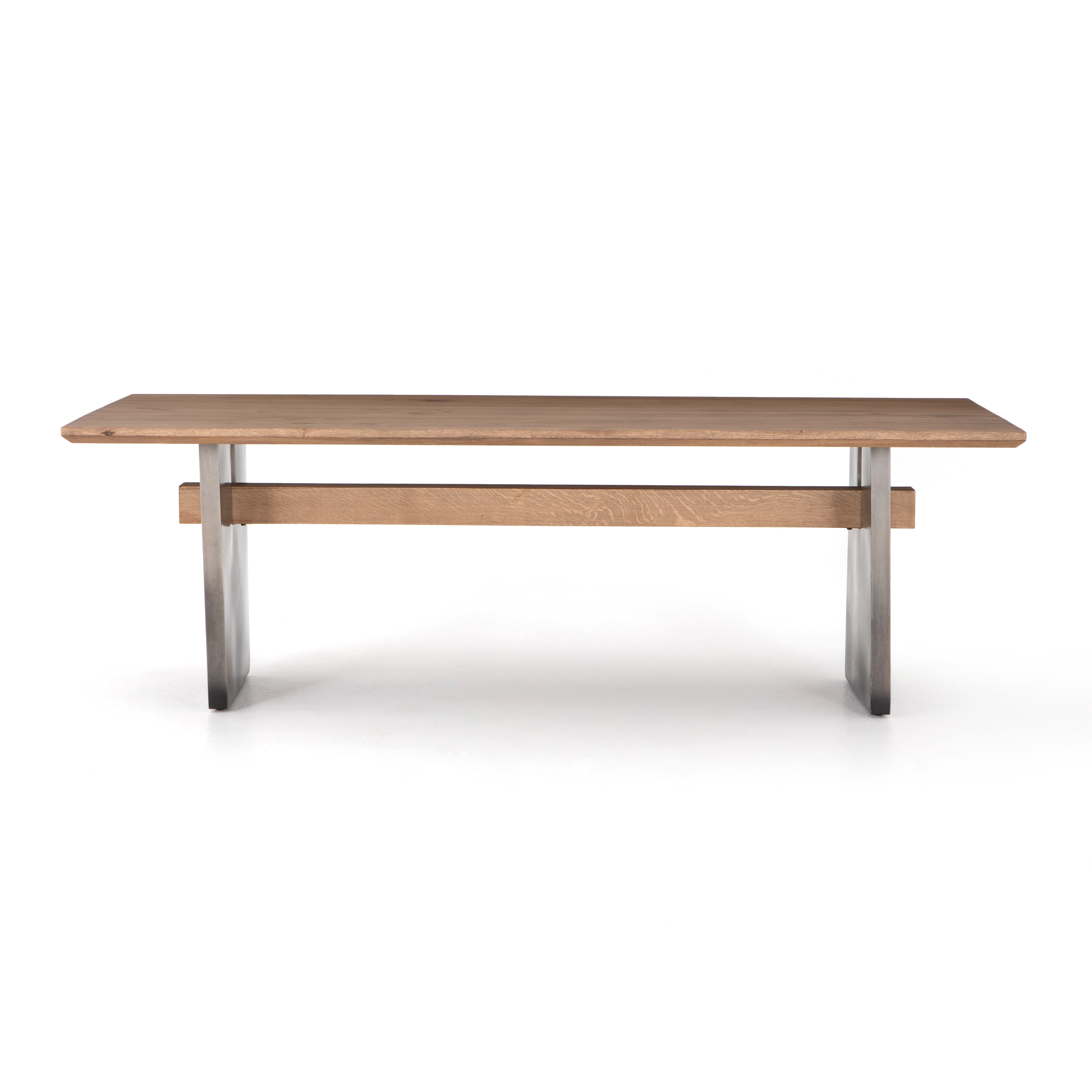 This Brennan Dining Table - Dove Oak has a rectangular soft-grey oak tabletop and flaunts its materials' natural graining, for a richly organic takeaway. Wide, plank-style legs of pewter-finished steel features an ombre pattern -- a statement piece for any dining room or kitchen area.   Overall Dimensions: 94.00"w x 42.00"d x 30.00"h