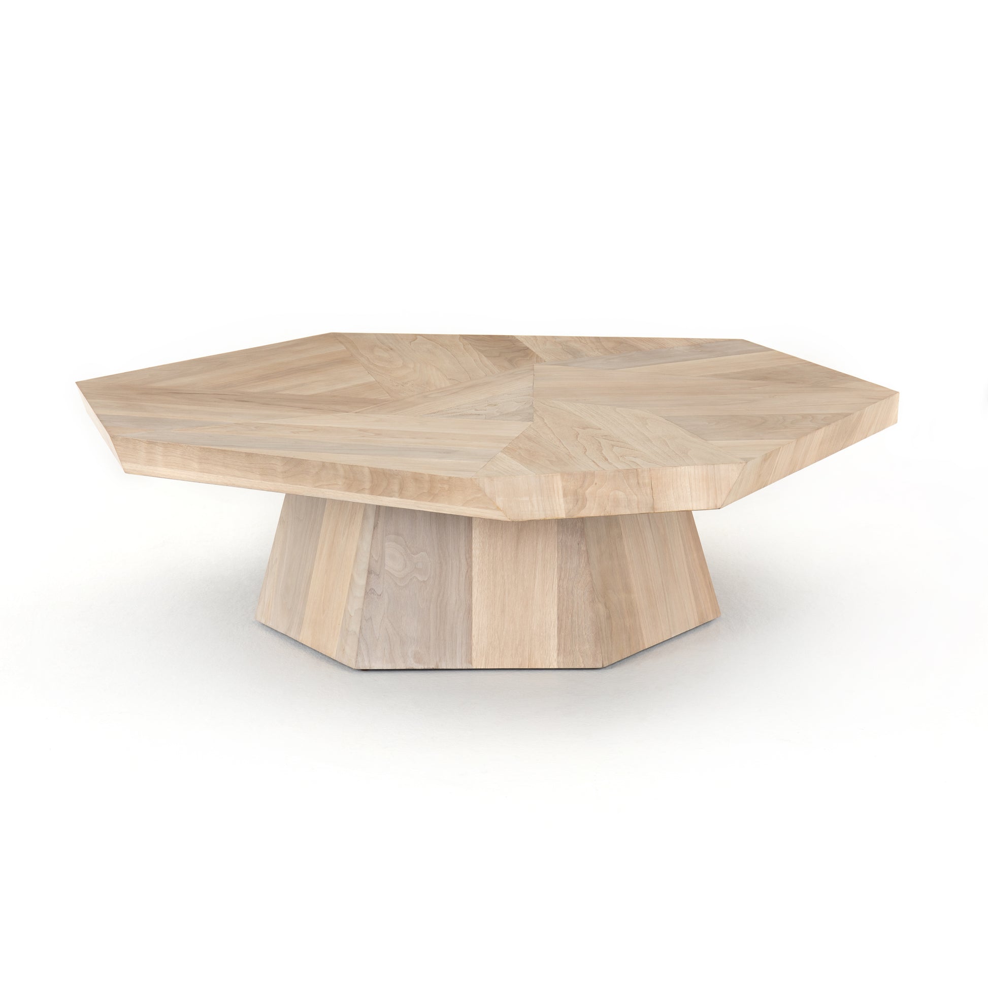 We love the asymmetric sides that form a casual octagon in this Brooklyn Coffee Table - Ashen Walnut. A shape-centric statement piece to add to your living room or lounge area.  Each style slightly unique, thanks to materials' natural quality.  Overall Dimensions: 53.25"w x 50.75"d x 16.50"h