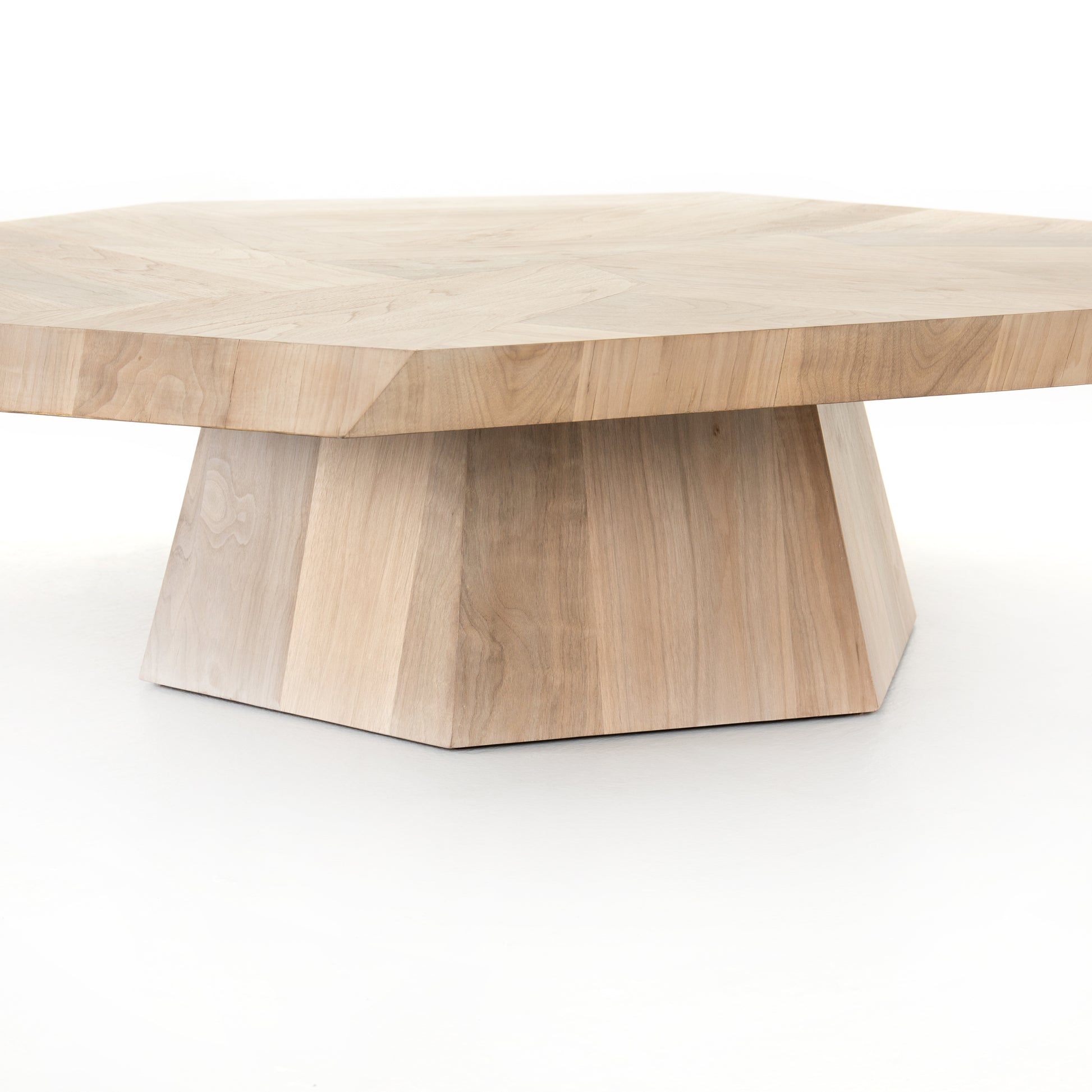 We love the asymmetric sides that form a casual octagon in this Brooklyn Coffee Table - Ashen Walnut. A shape-centric statement piece to add to your living room or lounge area.  Each style slightly unique, thanks to materials' natural quality.  Overall Dimensions: 53.25"w x 50.75"d x 16.50"h