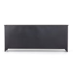 A black iron frame with windowpane detail contrasts a stark white interior for an updated take on the traditional media console. Open-front glass doors and ample shelving maximize storage and display options.  Size: 94.50"w x 16.00"d x 39.50"h Colors: Tempered Glass, Painted White, Black Materials: Glass, Iron