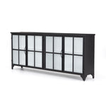 A black iron frame with windowpane detail contrasts a stark white interior for an updated take on the traditional media console. Open-front glass doors and ample shelving maximize storage and display options.  Size: 94.50"w x 16.00"d x 39.50"h Colors: Tempered Glass, Painted White, Black Materials: Glass, Iron