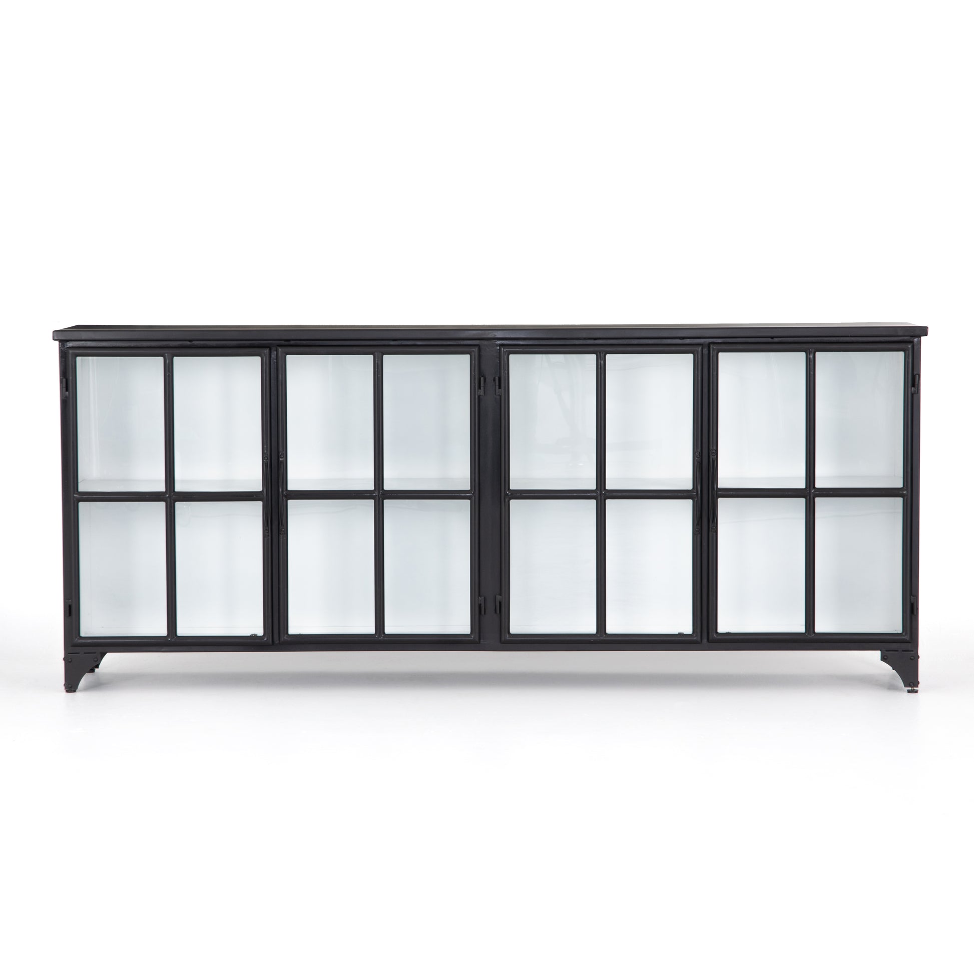 A black iron frame with windowpane detail contrasts a stark white interior for an updated take on the traditional media console. Open-front glass doors and ample shelving maximize storage and display options.  Size: 94.50"w x 16.00"d x 39.50"h Colors: Tempered Glass, Painted White, Black Materials: Glass, Iron
