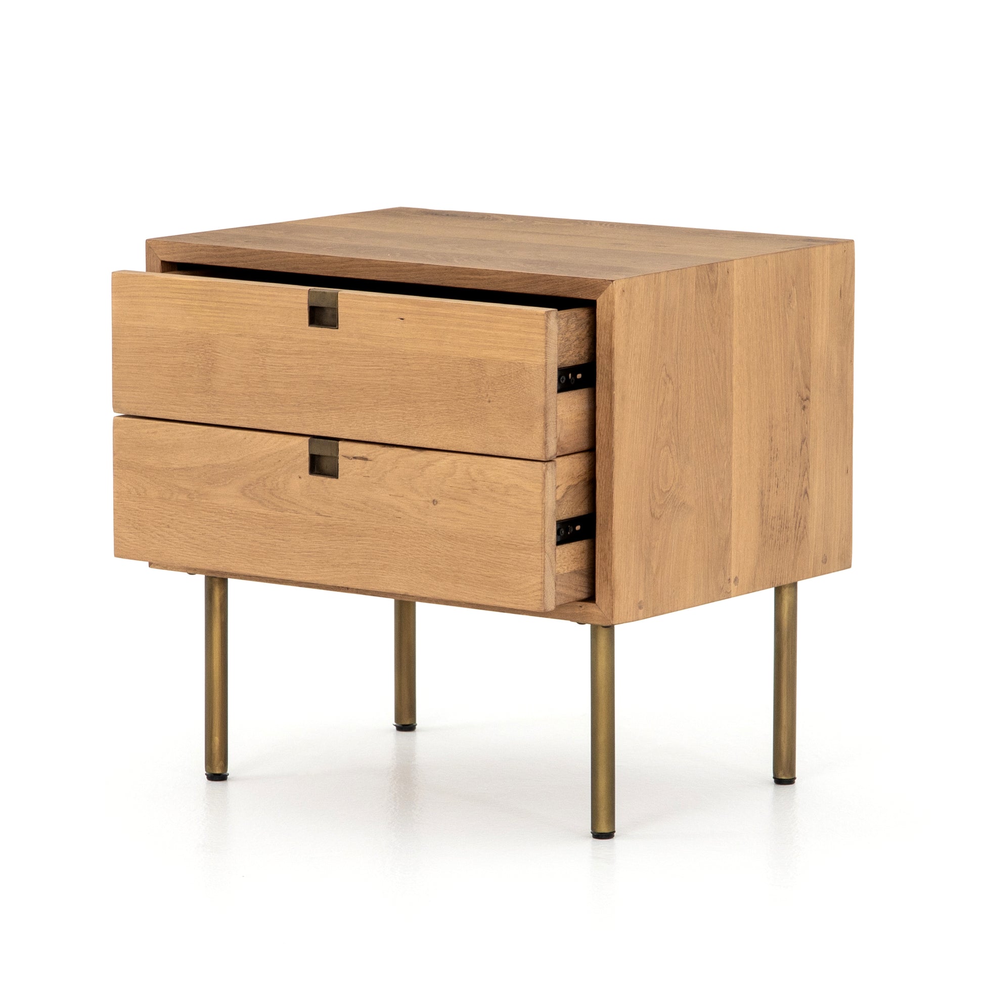 Style meets simplicity in this Danish-inspired design. Solid natural oak forms clean lines, welcoming dual drawers with squared iron hardware in a satin brass finish. Great solo or in pairs, for handy bedside storage.  Overall Dimensions: 24.00"w x 18.00"d x 23.00"h Colors: Satin Brass, Natural Oak Materials: Iron, Oak