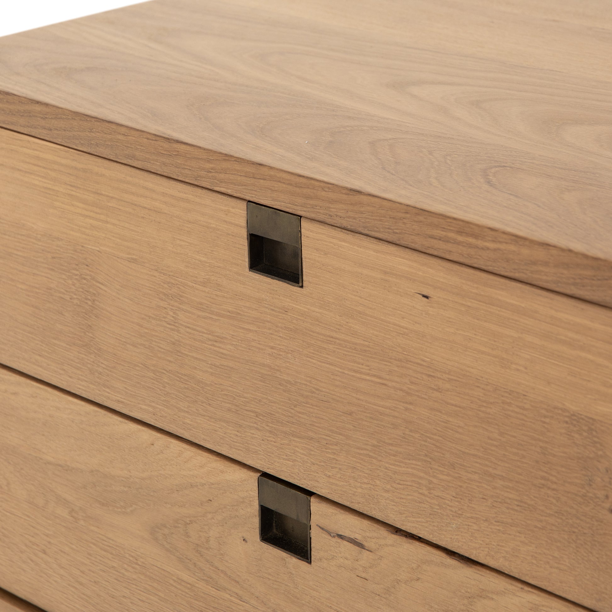 Style meets simplicity in this Danish-inspired design. Solid natural oak forms clean lines, welcoming dual drawers with squared iron hardware in a satin brass finish. Great solo or in pairs, for handy bedside storage.  Overall Dimensions: 24.00"w x 18.00"d x 23.00"h Colors: Satin Brass, Natural Oak Materials: Iron, Oak