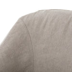 The traditional barrel chair gets a stylish, feminine update. Cunning curves covered in heather twill add eye-catching style and back-hugging support.  Size: 25.5" w x 25.25" d x 32.25" h Seat Depth: 19" Seat Height: 19.5" Arm Height from Floor: 24.5" Arm Height from Seat: 5"  Colors: Heather Twill Stone Materials: 50% Cotton/50% Jute