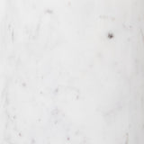 Simply sophisticated with this Cronos End Table - Polished White Marble. Finished in a polished white, a solid turned marble base supports a tray-style tabletop of grey-hammered iron, spurring beautifully eye-catching contrast for any living room or bedroom.   Overall Dimensions: 19.75"w x 19.75"d x 24.75"h