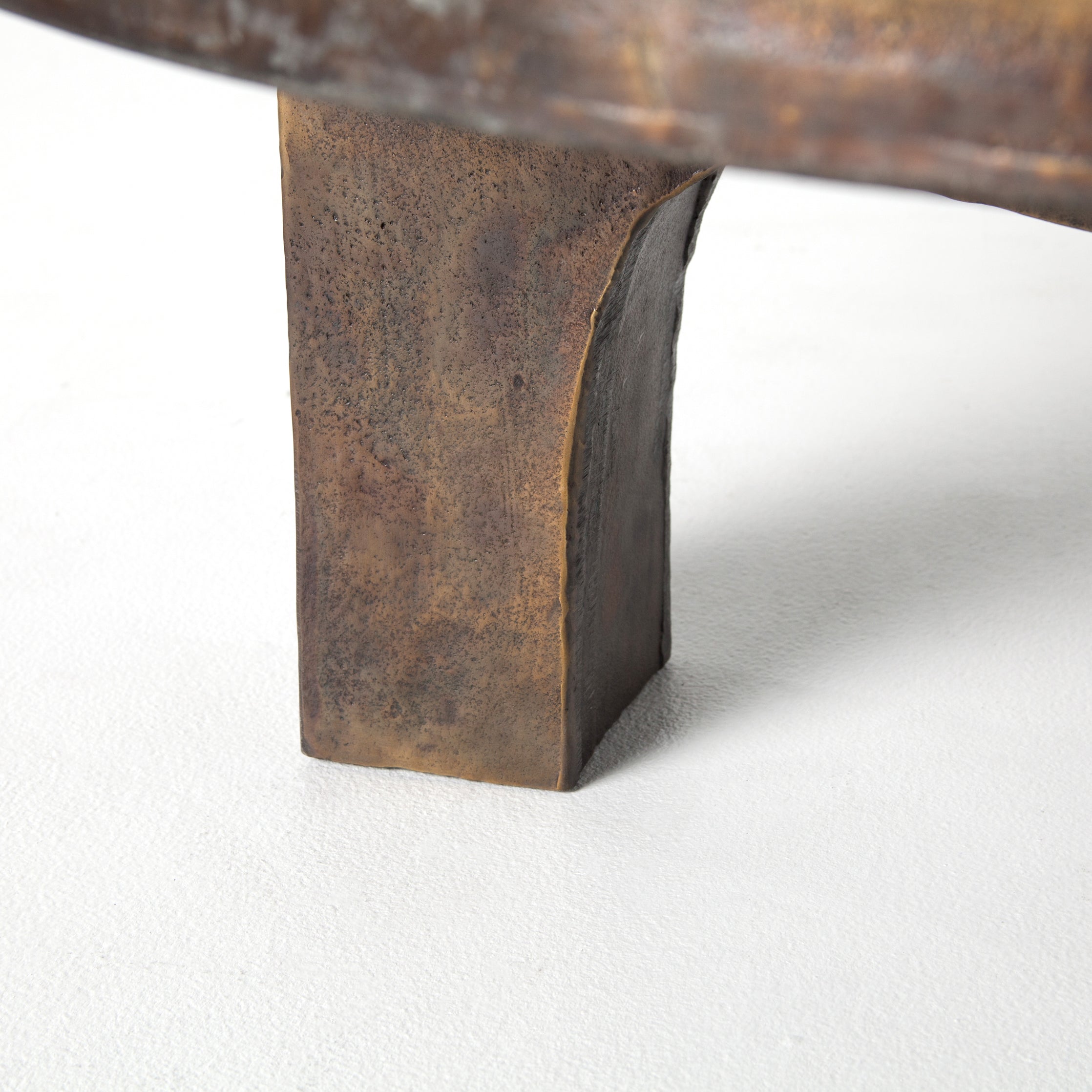 This Cruz Coffee Table - Antique Rust has a textured look finished in gorgeous antique rust. Safe for outdoor spaces — cover or store indoors during inclement weather and when not in use.  Overall Dimensions: 38.00"w x 38.00"d x 15.25"h