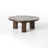 This Cruz Coffee Table - Antique Rust has a textured look finished in gorgeous antique rust. Safe for outdoor spaces — cover or store indoors during inclement weather and when not in use.  Overall Dimensions: 38.00"w x 38.00"d x 15.25"h