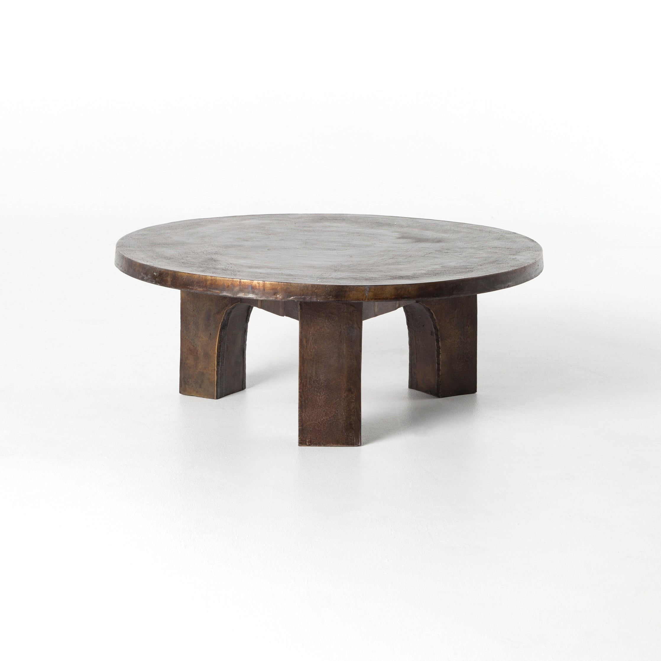 This Cruz Coffee Table - Antique Rust has a textured look finished in gorgeous antique rust. Safe for outdoor spaces — cover or store indoors during inclement weather and when not in use.  Overall Dimensions: 38.00"w x 38.00"d x 15.25"h