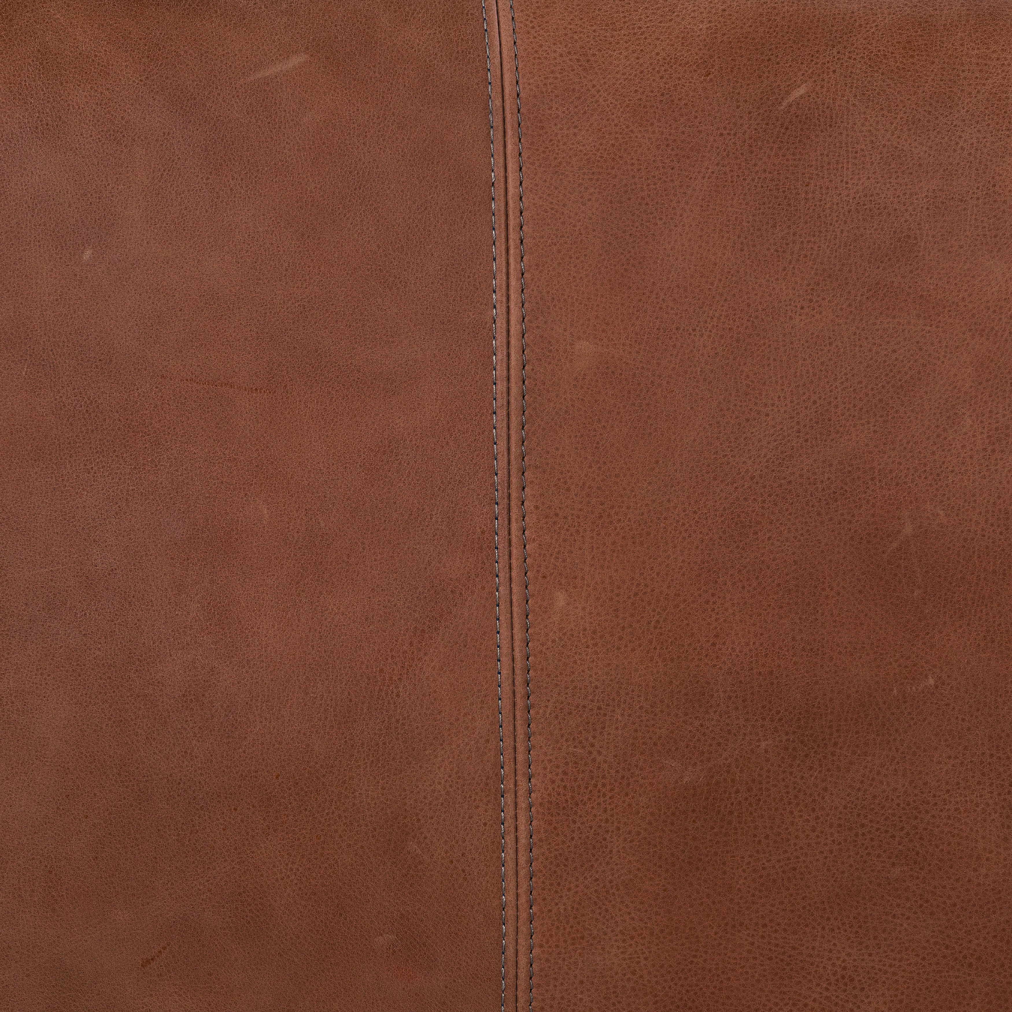 The Darrow Bench -  Palermo Cognac is a time-honored bench, reinvented. With fresh, clever shaping, angular gunmetal-finished iron supports spare-yet-comfortable top-grain leather cushioning in a rich cognac.  Overall Dimensions: 63.50"w x 17.50"d x 17.75"h
