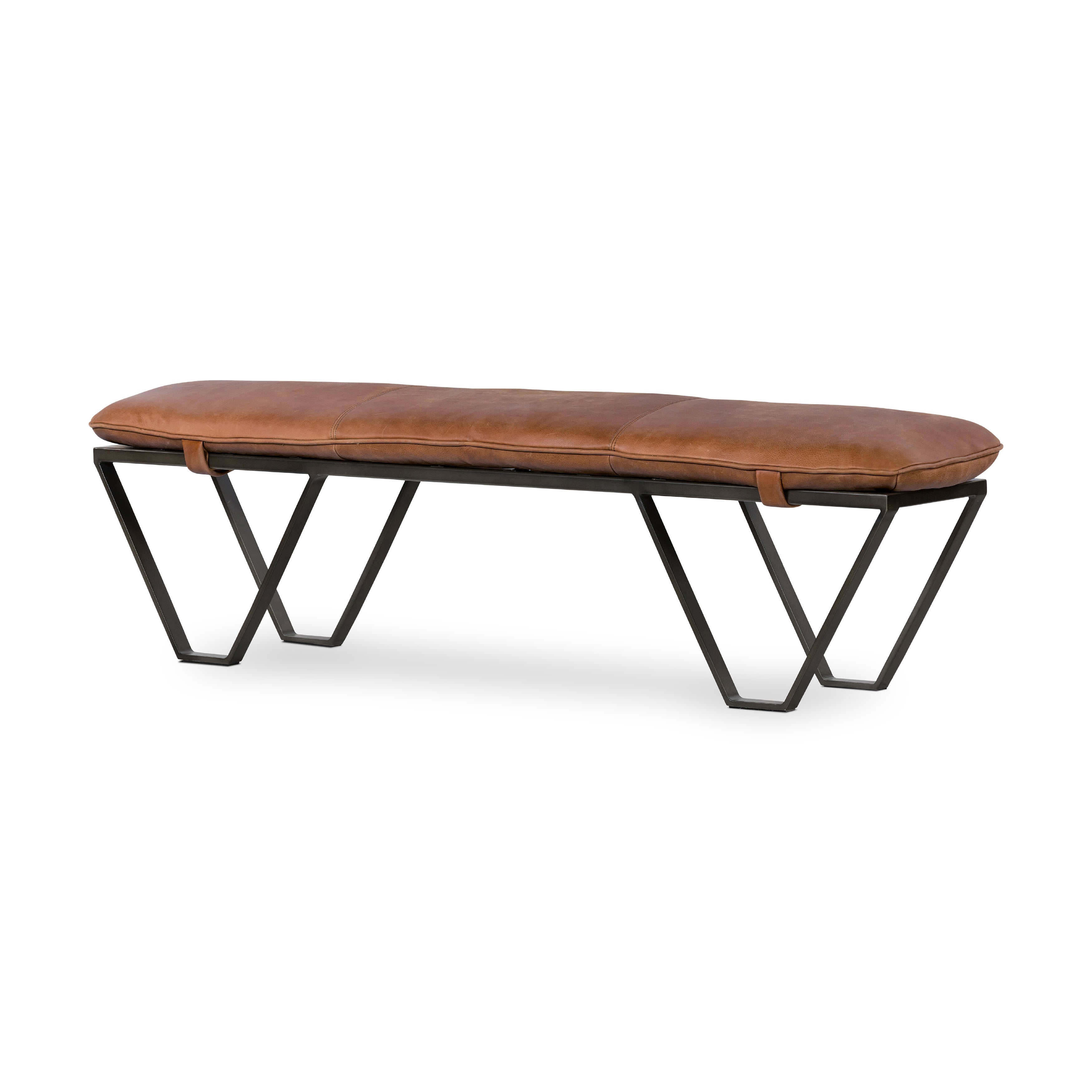 The Darrow Bench -  Palermo Cognac is a time-honored bench, reinvented. With fresh, clever shaping, angular gunmetal-finished iron supports spare-yet-comfortable top-grain leather cushioning in a rich cognac.  Overall Dimensions: 63.50"w x 17.50"d x 17.75"h