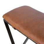 The Darrow Bench -  Palermo Cognac is a time-honored bench, reinvented. With fresh, clever shaping, angular gunmetal-finished iron supports spare-yet-comfortable top-grain leather cushioning in a rich cognac.  Overall Dimensions: 63.50"w x 17.50"d x 17.75"h
