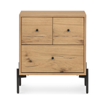 This Eaton Nightstand - Light Oak has a gorgeous, thick oak veneer with thin, iron legs. With one large drawer and two smaller drawers, this is the perfect nightstand to complete your bedroom.   Overall Dimensions: 23.50"w x 18.50"d x 26.00"h Colors: Dark Gunmetal, Light Oak Resin Materials: Iron, Thick Oak Veneer