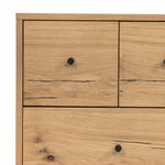 This Eaton Nightstand - Light Oak has a gorgeous, thick oak veneer with thin, iron legs. With one large drawer and two smaller drawers, this is the perfect nightstand to complete your bedroom.   Overall Dimensions: 23.50"w x 18.50"d x 26.00"h Colors: Dark Gunmetal, Light Oak Resin Materials: Iron, Thick Oak Veneer