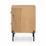 This Eaton Nightstand - Light Oak has a gorgeous, thick oak veneer with thin, iron legs. With one large drawer and two smaller drawers, this is the perfect nightstand to complete your bedroom.   Overall Dimensions: 23.50"w x 18.50"d x 26.00"h Colors: Dark Gunmetal, Light Oak Resin Materials: Iron, Thick Oak Veneer