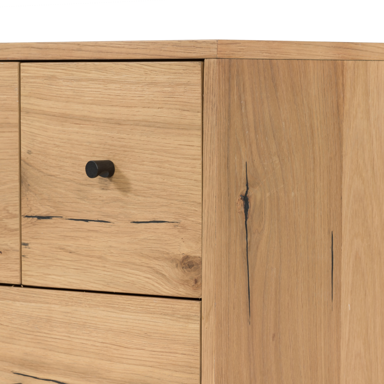 This Eaton Nightstand - Light Oak has a gorgeous, thick oak veneer with thin, iron legs. With one large drawer and two smaller drawers, this is the perfect nightstand to complete your bedroom.   Overall Dimensions: 23.50"w x 18.50"d x 26.00"h Colors: Dark Gunmetal, Light Oak Resin Materials: Iron, Thick Oak Veneer