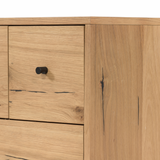 This Eaton Nightstand - Light Oak has a gorgeous, thick oak veneer with thin, iron legs. With one large drawer and two smaller drawers, this is the perfect nightstand to complete your bedroom.   Overall Dimensions: 23.50"w x 18.50"d x 26.00"h Colors: Dark Gunmetal, Light Oak Resin Materials: Iron, Thick Oak Veneer