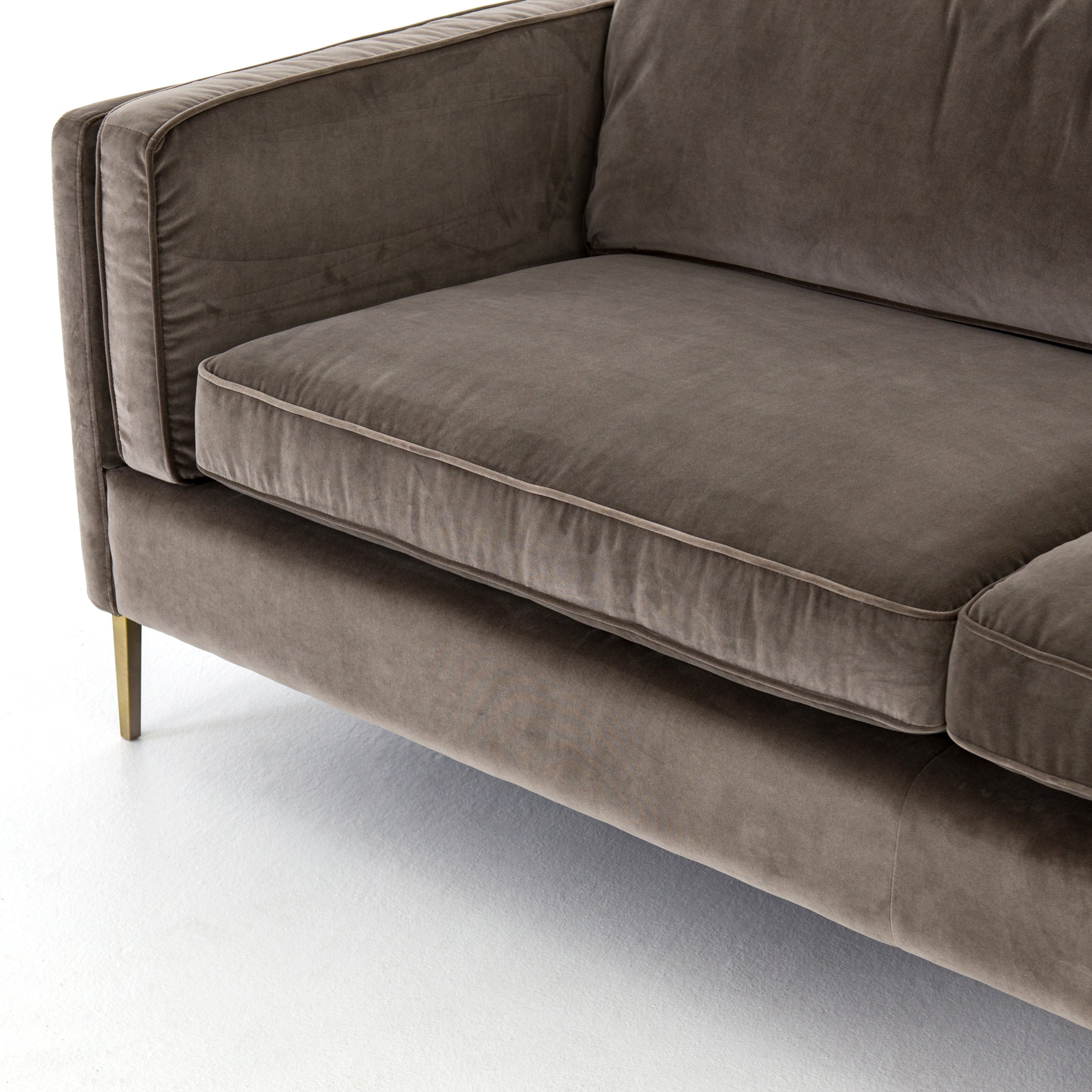 Featuring Emery Sofa - Sapphire Birch by Four Hands at Amethyst Home. We love the plush brich-grey upholstery of this Emery Sofa - Sapphire Birch. The slim legs are finished in a gorgeous antique brass, for a sophisticated look for any living room or lounge area. 
Overall Dimensions: 84"W x 36"L x 33"HColors: Sapphire Birch, Antique BrassMaterials: 92%Pl, .  Amethyst Home provides interior design, new home construction design consulting, vintage area rugs, and lighting in the San Diego metro area.