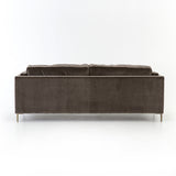 Featuring Emery Sofa - Sapphire Birch by Four Hands at Amethyst Home. We love the plush brich-grey upholstery of this Emery Sofa - Sapphire Birch. The slim legs are finished in a gorgeous antique brass, for a sophisticated look for any living room or lounge area. 
Overall Dimensions: 84"W x 36"L x 33"HColors: Sapphire Birch, Antique BrassMaterials: 92%Pl, 5%Co.  Amethyst Home provides interior design, new home construction design consulting, vintage area rugs, and lighting in the Miami metro area.