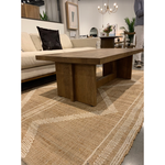 We love the rustic look of this Erie Coffee Table. Dark-smoked oak forms clean, structured lines, crafting the finest of coffee tables.   Overall Dimensions: 51.00"w x 27.50"d x 17.50"h