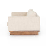 Classic goes contemporary with this Everly Sofa - Irving Taupe. A cocoa-finished parawood base supports low, deep seating of performance-grade upholstery in an invitingly neutral taupe, with track arms for a clean touch for any living room or lounge area.   Overall Dimensions: 84.00"w x 43.00"d x 32.00"h