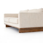 Classic goes contemporary with this Everly Sofa - Irving Taupe. A cocoa-finished parawood base supports low, deep seating of performance-grade upholstery in an invitingly neutral taupe, with track arms for a clean touch for any living room or lounge area.   Overall Dimensions: 84.00"w x 43.00"d x 32.00"h