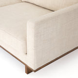 Classic goes contemporary with this Everly Sofa - Irving Taupe. A cocoa-finished parawood base supports low, deep seating of performance-grade upholstery in an invitingly neutral taupe, with track arms for a clean touch for any living room or lounge area.   Overall Dimensions: 84.00"w x 43.00"d x 32.00"h