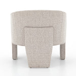 This Fae Chair - Bellamy Storm is well-tailored and stylistically unique. The Italian boucle lends a high-fashion feel to a cleverly constructed three-legged design.  Overall Dimensions: 30.25"w x 29.50"d x 29.50"h