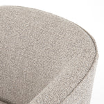 This Fae Chair - Bellamy Storm is well-tailored and stylistically unique. The Italian boucle lends a high-fashion feel to a cleverly constructed three-legged design.  Overall Dimensions: 30.25"w x 29.50"d x 29.50"h