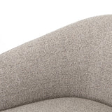 This Fae Chair - Bellamy Storm is well-tailored and stylistically unique. The Italian boucle lends a high-fashion feel to a cleverly constructed three-legged design.  Overall Dimensions: 30.25"w x 29.50"d x 29.50"h