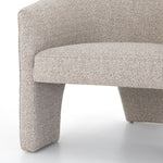 This Fae Chair - Bellamy Storm is well-tailored and stylistically unique. The Italian boucle lends a high-fashion feel to a cleverly constructed three-legged design.  Overall Dimensions: 30.25"w x 29.50"d x 29.50"h