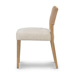We love the mixed materials found on this Ferris Dining Chair - Winchester Beige. Solid parawood forms a slight, simple frame for squared seating upholstered in high-performance fabric. Tan top-grain leather backing takes this modern-minded dining chair to the next level.  Overall Dimensions: 20.00"w x 21.75"d x 32.00"h