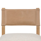 We love the mixed materials found on this Ferris Dining Chair - Winchester Beige. Solid parawood forms a slight, simple frame for squared seating upholstered in high-performance fabric. Tan top-grain leather backing takes this modern-minded dining chair to the next level.  Overall Dimensions: 20.00"w x 21.75"d x 32.00"h