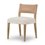 We love the mixed materials found on this Ferris Dining Chair - Winchester Beige. Solid parawood forms a slight, simple frame for squared seating upholstered in high-performance fabric. Tan top-grain leather backing takes this modern-minded dining chair to the next level.  Overall Dimensions: 20.00"w x 21.75"d x 32.00"h