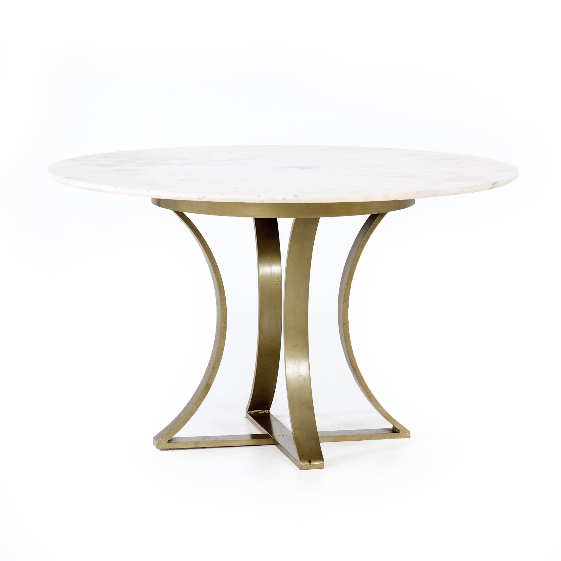Sophisticated materials take a cue from modern geometry. Cast brass iron forms uniquely-curved angles to balance a contrasting polished white marble top. A refined spin on trend-forward design.  Dimensions: 48"w x 48"d x 30"h, or 60"w x 60"d x 30"h    Colors: Cast Brass, Polished White Marble Materials: Iron, Marble