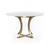 Sophisticated materials take a cue from modern geometry. Cast brass iron forms uniquely-curved angles to balance a contrasting polished white marble top. A refined spin on trend-forward design.  Dimensions: 48"w x 48"d x 30"h, or 60"w x 60"d x 30"h    Colors: Cast Brass, Polished White Marble Materials: Iron, Marble