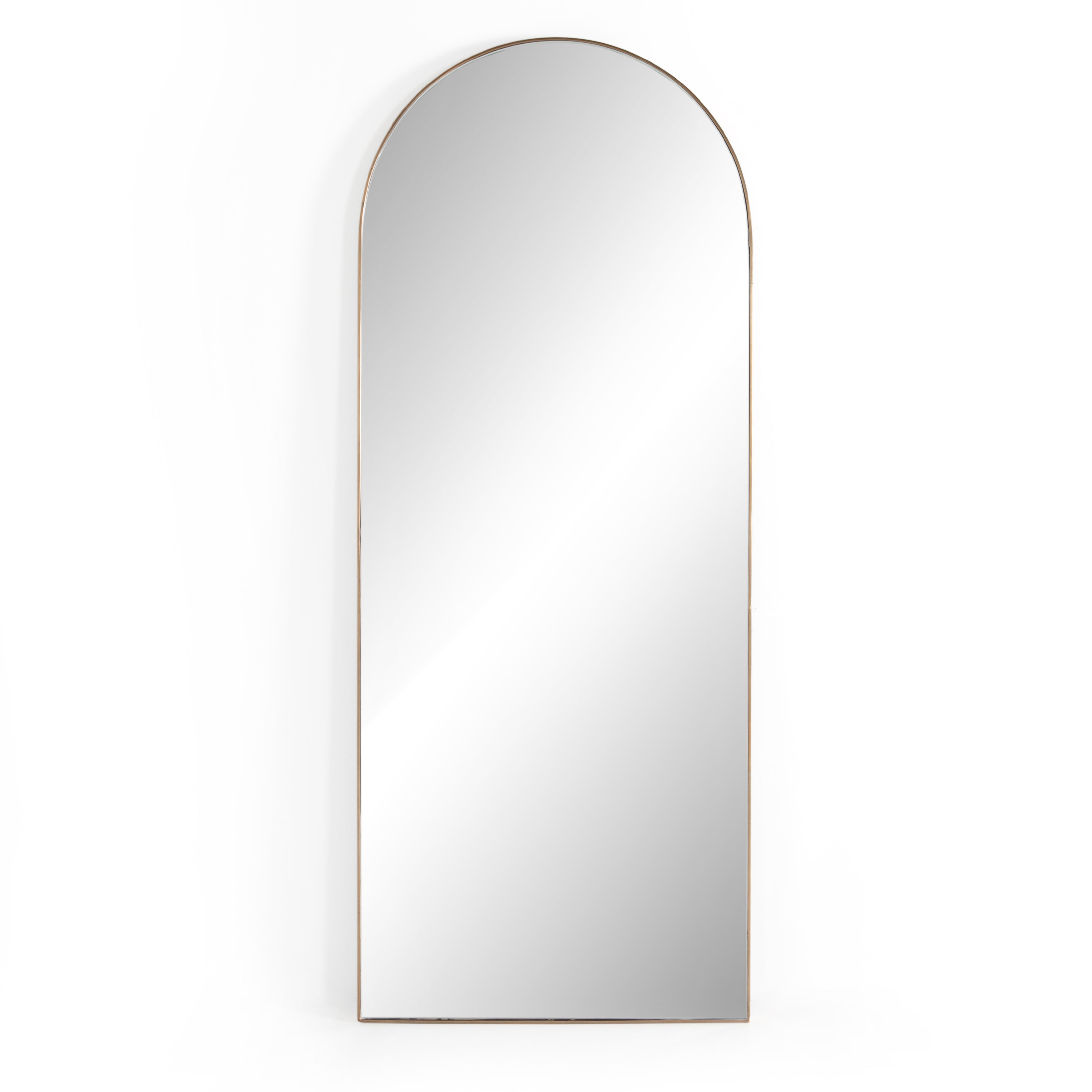 This Georgina Floor Mirror has a beautiful arch with a rose gold-finish aluminum frame. This will be the go-to mirror at home to try on your newest shopping haul or take that shameless selfie in.  Overall Dimensions: 32.00"w x 2.00"d x 80.00"h Colors: Polished Brass, Mirror Materials: Aluminum, Mirror Weight: 110  Please allow 3-4 weeks on shipment for these items. 