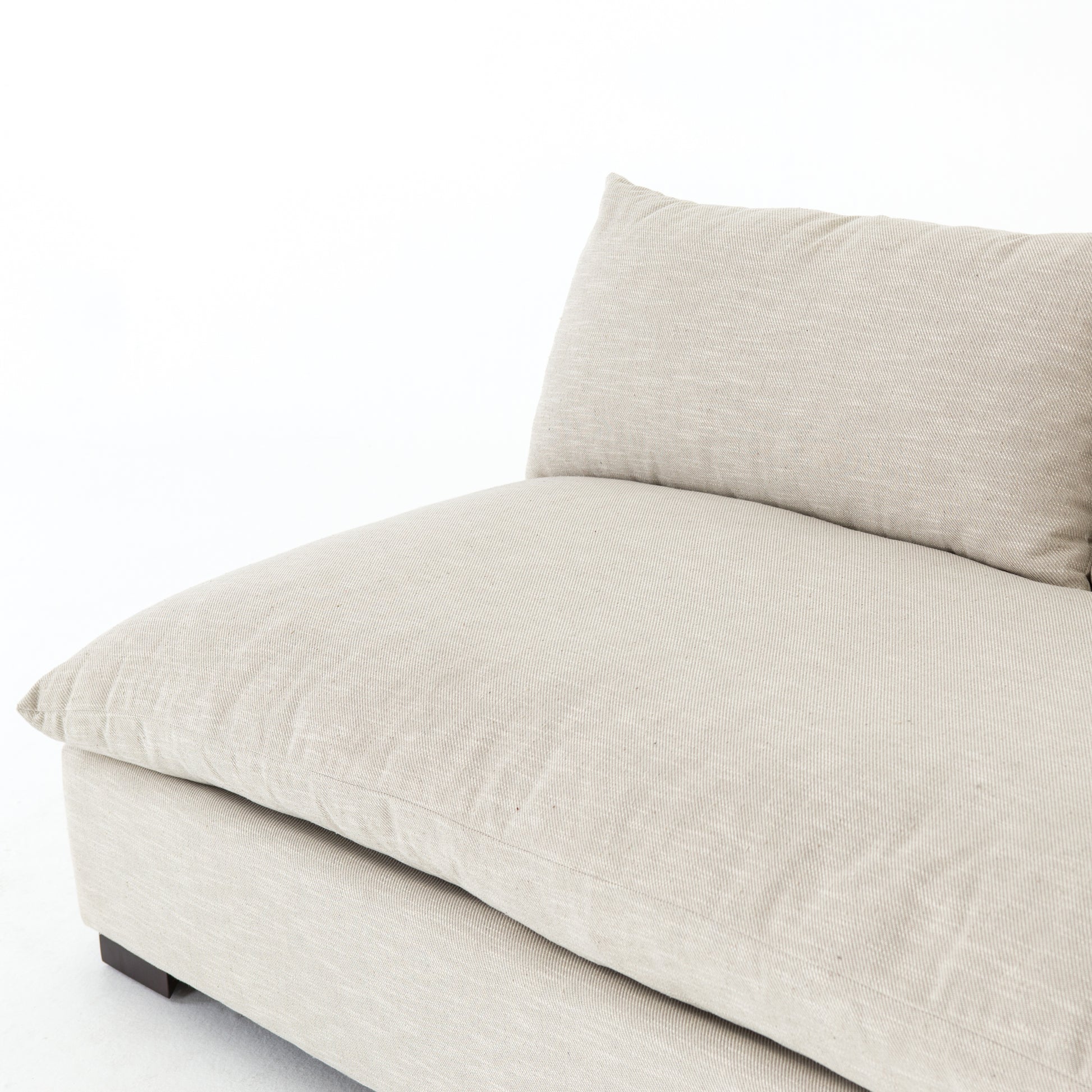 The upholstery of this Grant Armless Piece - Oatmeal is soft, durable, and stain-resistance, making it the perfect choice for families or those who love to cuddle with their furry friends.   Overall Dimensions: 72.00"w x 40.00"d x 31.50"h