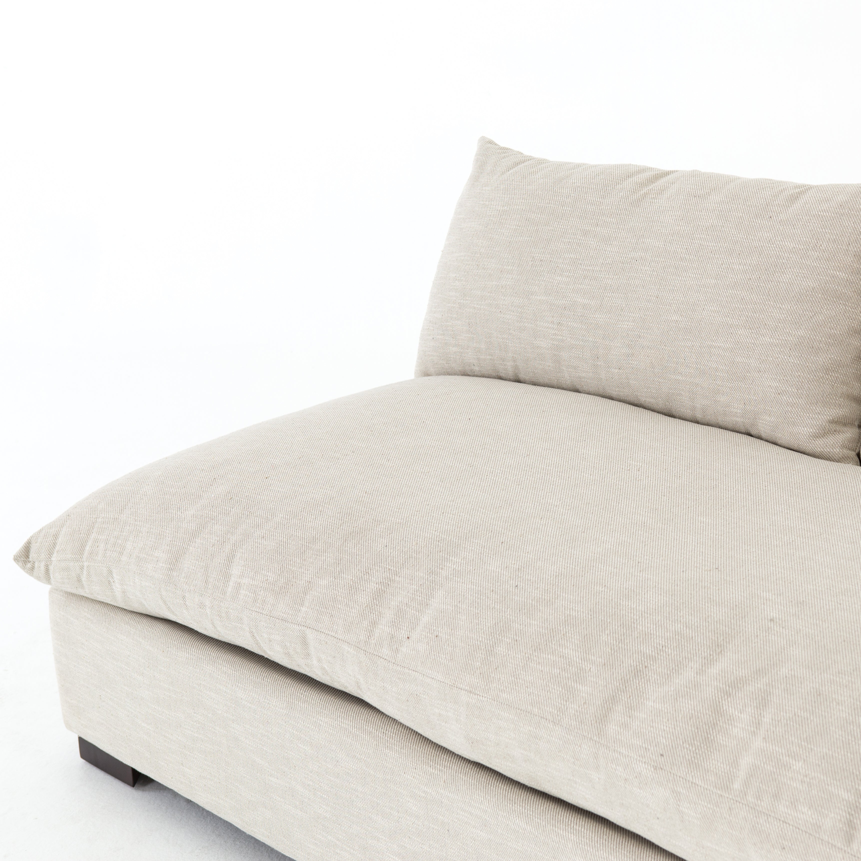The upholstery of this Grant Armless Piece - Oatmeal is soft, durable, and stain-resistance, making it the perfect choice for families or those who love to cuddle with their furry friends.   Overall Dimensions: 72.00"w x 40.00"d x 31.50"h