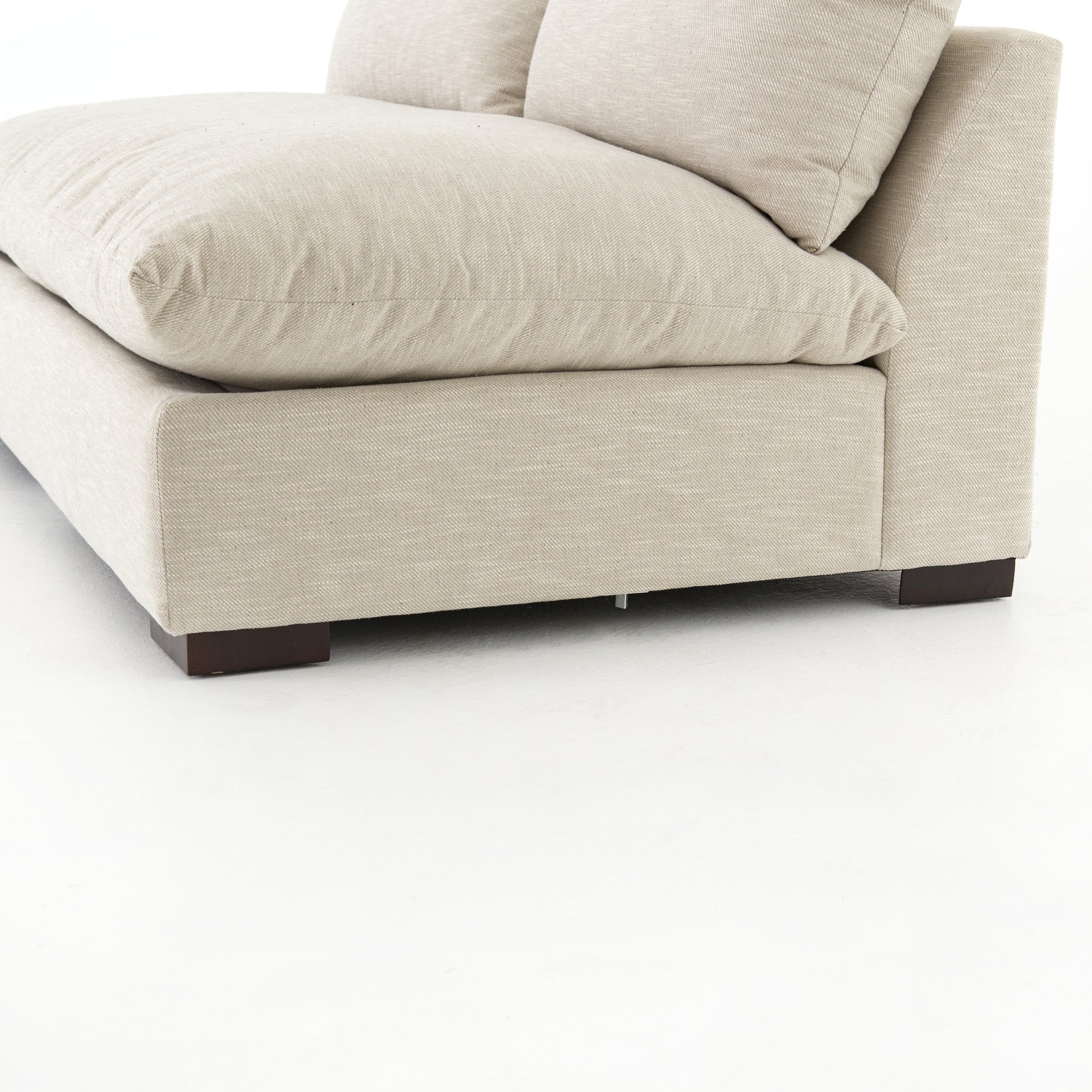 The upholstery of this Grant Armless Piece - Oatmeal is soft, durable, and stain-resistance, making it the perfect choice for families or those who love to cuddle with their furry friends.   Overall Dimensions: 72.00"w x 40.00"d x 31.50"h