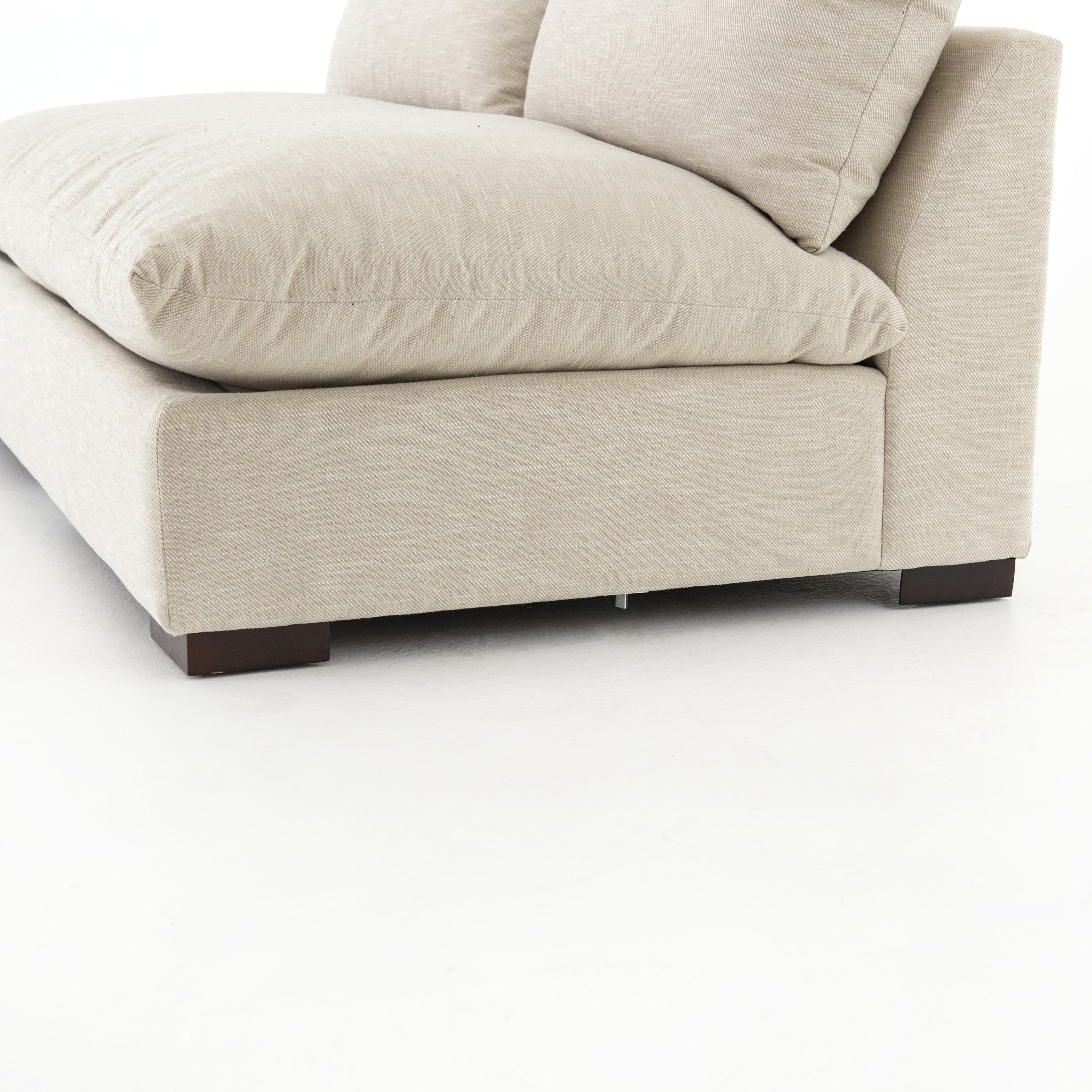 The upholstery of this Grant Armless Piece - Oatmeal is soft, durable, and stain-resistance, making it the perfect choice for families or those who love to cuddle with their furry friends.   Overall Dimensions: 72.00"w x 40.00"d x 31.50"h