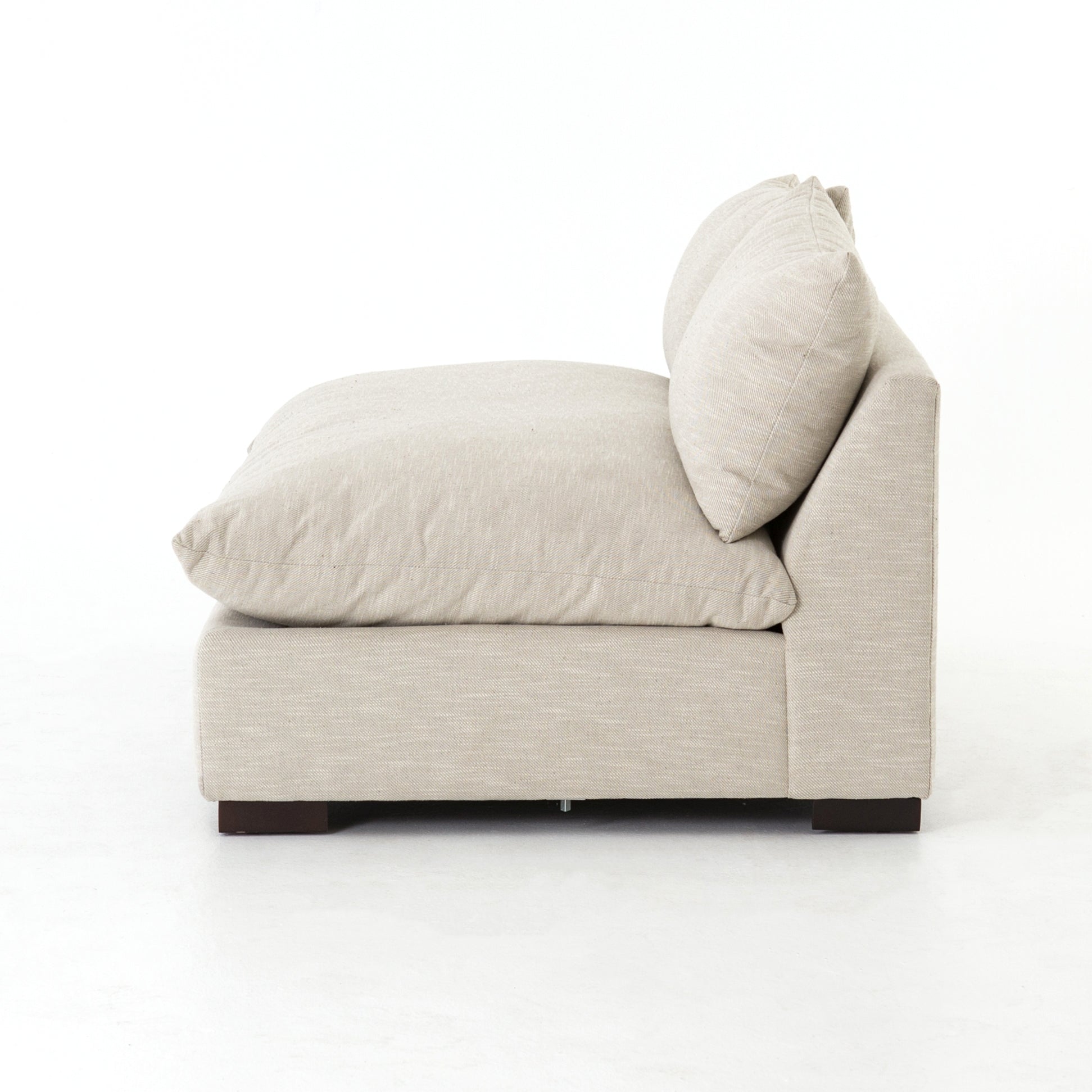 The upholstery of this Grant Armless Piece - Oatmeal is soft, durable, and stain-resistance, making it the perfect choice for families or those who love to cuddle with their furry friends.   Overall Dimensions: 72.00"w x 40.00"d x 31.50"h