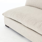 The upholstery of this Grant Armless Piece - Oatmeal is soft, durable, and stain-resistance, making it the perfect choice for families or those who love to cuddle with their furry friends.   Overall Dimensions: 72.00"w x 40.00"d x 31.50"h