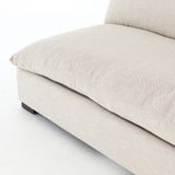 The upholstery of this Grant Armless Piece - Oatmeal is soft, durable, and stain-resistance, making it the perfect choice for families or those who love to cuddle with their furry friends.   Overall Dimensions: 72.00"w x 40.00"d x 31.50"h